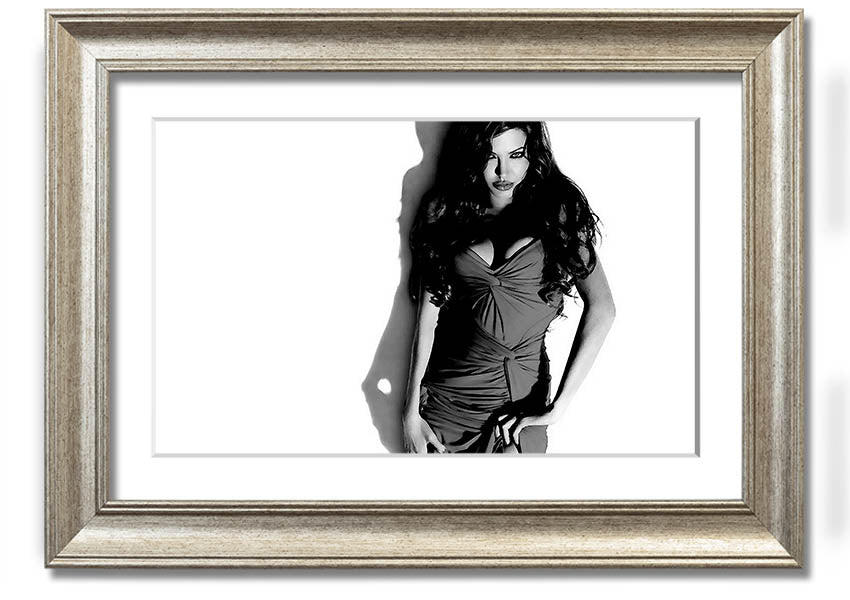 Framed print of Angelina Jolie in a black and white dress, showcasing elegance and style, available in multiple frame colors.