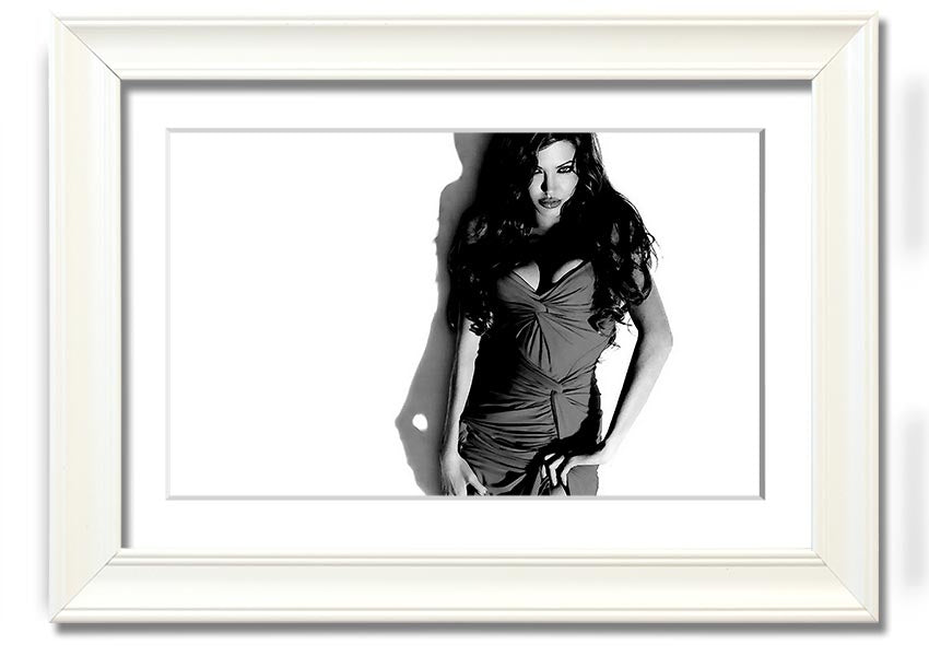 Framed print of Angelina Jolie in a black and white dress, showcasing elegance and style, available in multiple frame colors.