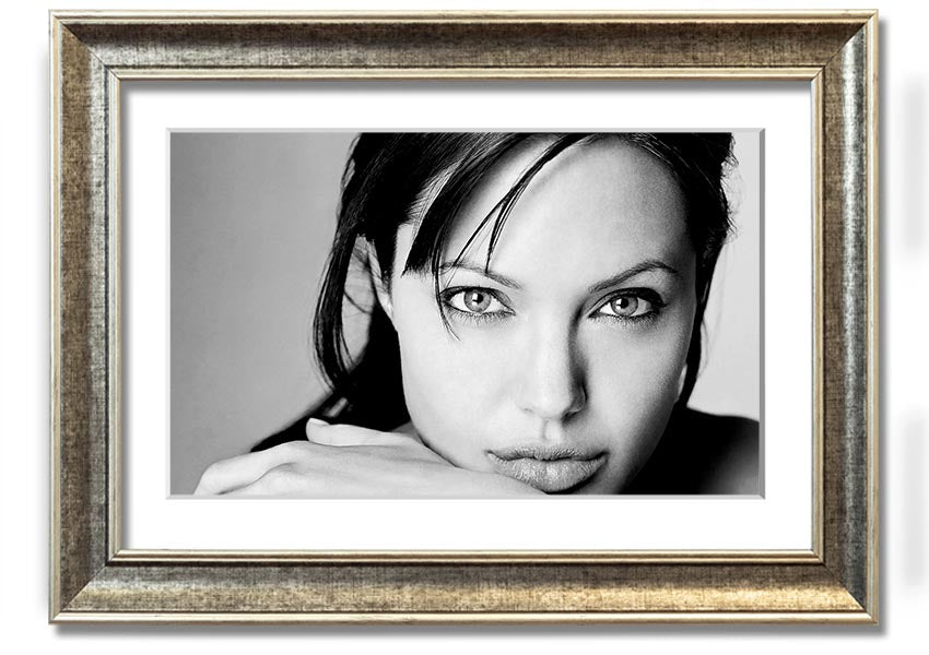 Framed print of Angelina Jolie, showcasing her intimate portrait with elegant framing options.