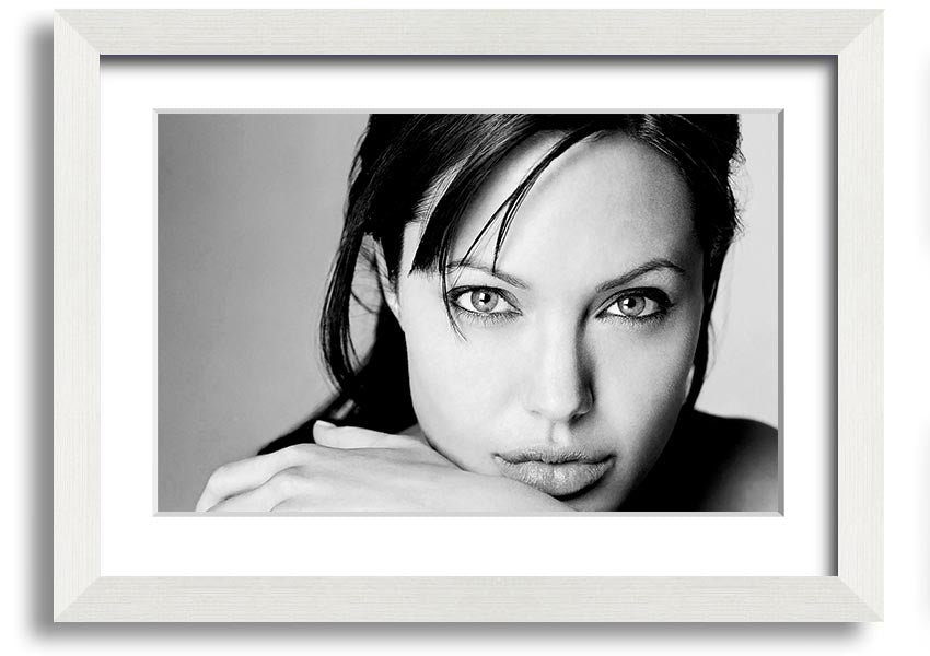 Framed print of Angelina Jolie, showcasing her intimate portrait with elegant framing options.