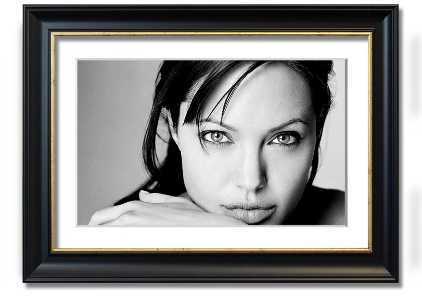 Framed print of Angelina Jolie, showcasing her intimate portrait with elegant framing options.