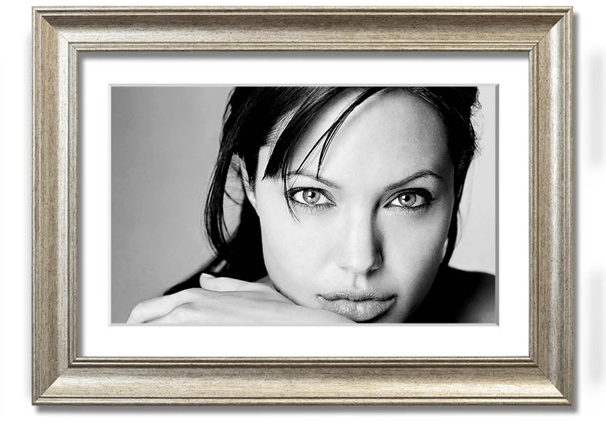 Framed print of Angelina Jolie, showcasing her intimate portrait with elegant framing options.