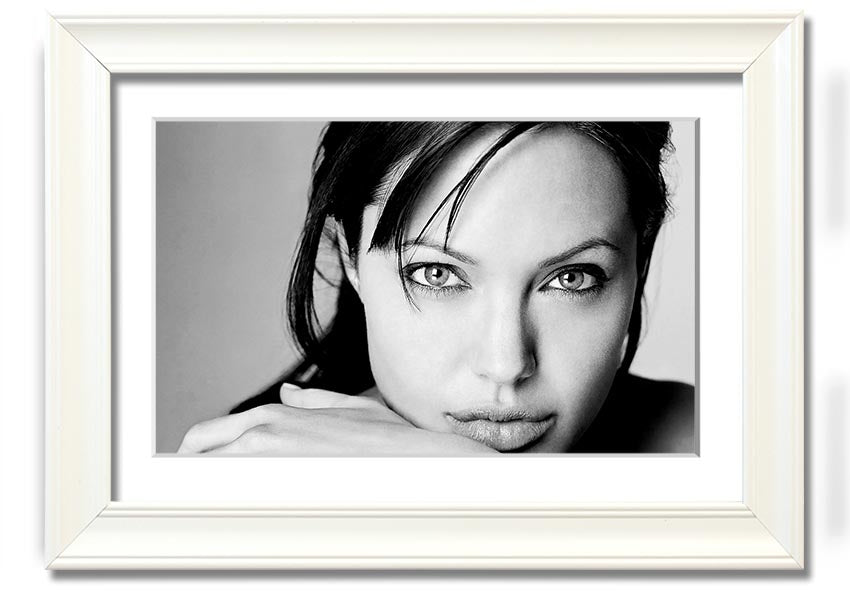 Framed print of Angelina Jolie, showcasing her intimate portrait with elegant framing options.