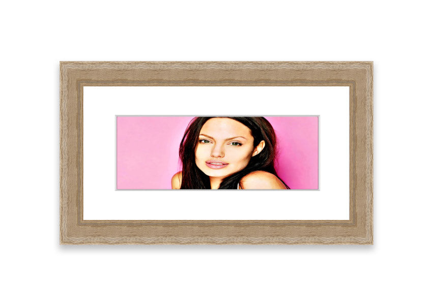 Framed print of Angelina Jolie in pink, showcasing vibrant colors and elegant design, ready to hang.