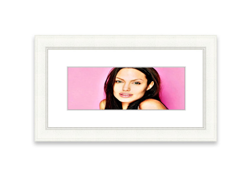 Framed print of Angelina Jolie in pink, showcasing vibrant colors and elegant design, ready to hang.