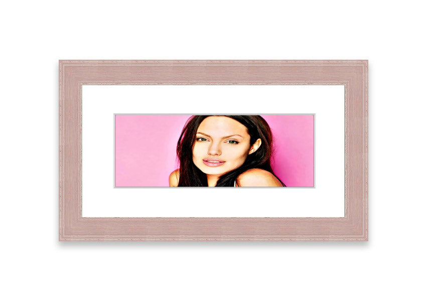 Framed print of Angelina Jolie in pink, showcasing vibrant colors and elegant design, ready to hang.