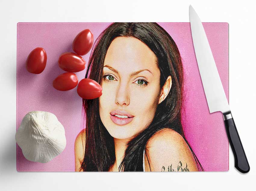 Angelina Jolie Pink chopping board made of tempered glass with a chinchilla ripple effect and anti-slip feet.