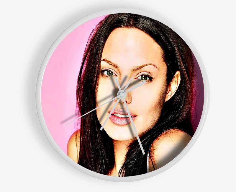 Angelina Jolie Pink clock made from natural bamboo with a round face and clear Plexiglas lens, available in black, white, and natural frame colors.