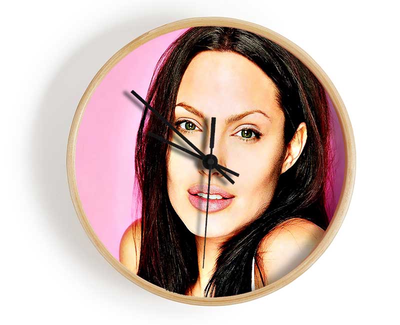 Angelina Jolie Pink clock made from natural bamboo with a round face and clear Plexiglas lens, available in black, white, and natural frame colors.