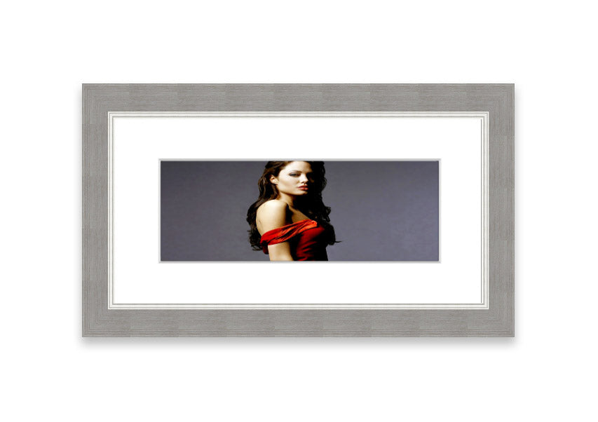 Framed print of Angelina Jolie in a red dress, showcasing elegance and beauty.