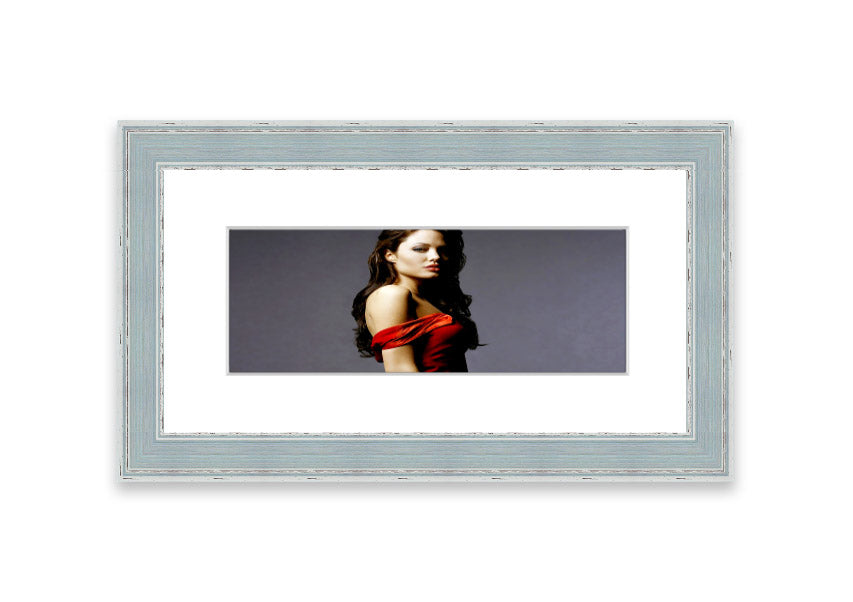 Framed print of Angelina Jolie in a red dress, showcasing elegance and beauty.