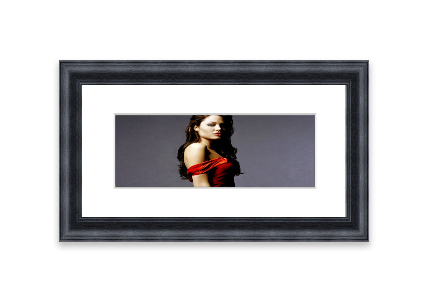 Framed print of Angelina Jolie in a red dress, showcasing elegance and beauty.