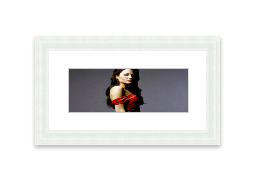 Framed print of Angelina Jolie in a red dress, showcasing elegance and beauty.