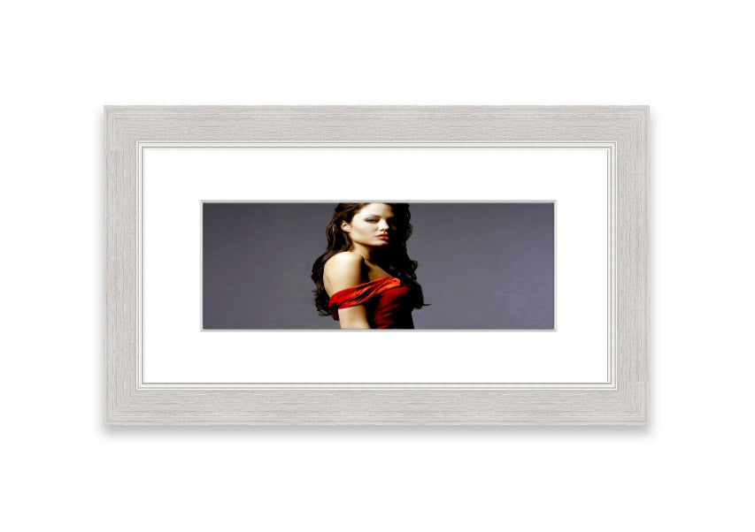 Framed print of Angelina Jolie in a red dress, showcasing elegance and beauty.