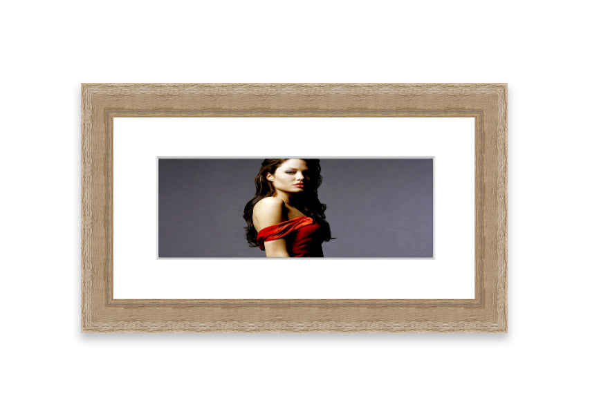 Framed print of Angelina Jolie in a red dress, showcasing elegance and beauty.