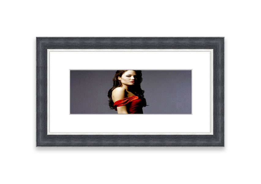 Framed print of Angelina Jolie in a red dress, showcasing elegance and beauty.