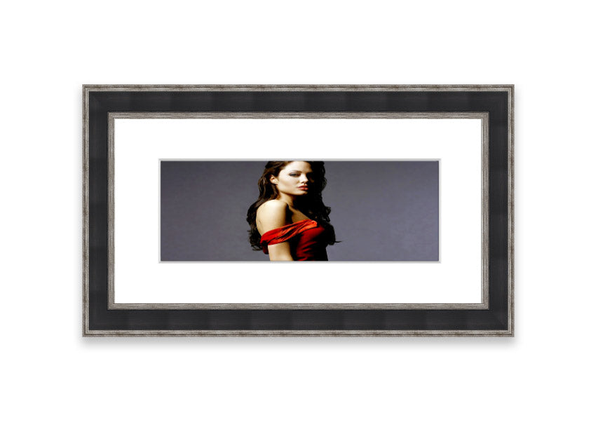 Framed print of Angelina Jolie in a red dress, showcasing elegance and beauty.