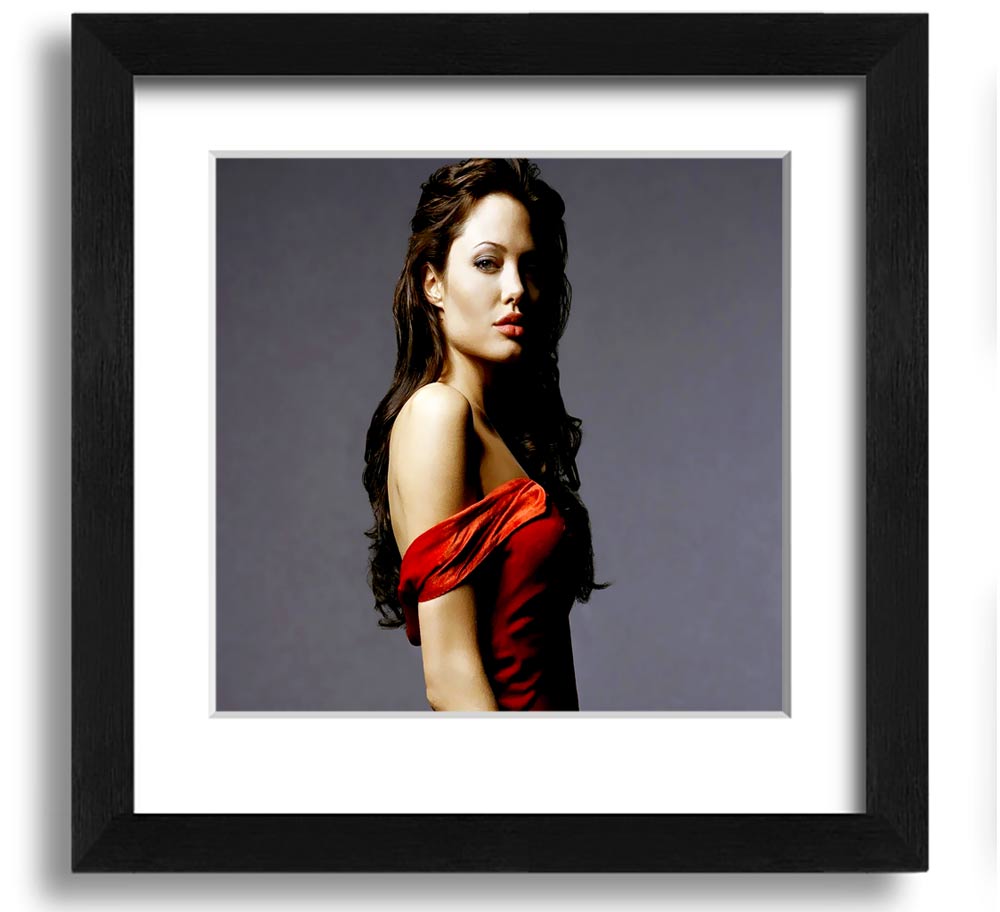 Framed print of Angelina Jolie in a red dress, showcasing elegance and style.