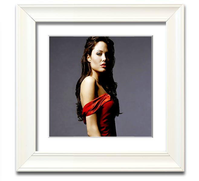 Framed print of Angelina Jolie in a red dress, showcasing elegance and style.