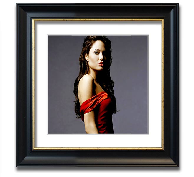 Framed print of Angelina Jolie in a red dress, showcasing elegance and style.