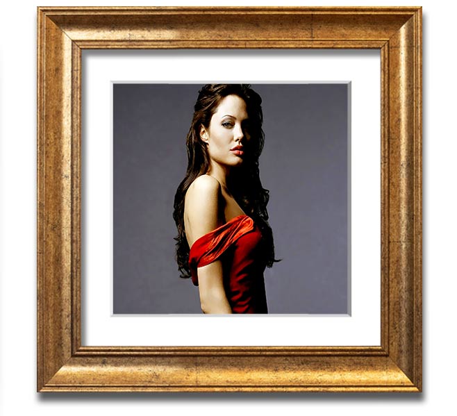 Framed print of Angelina Jolie in a red dress, showcasing elegance and style.