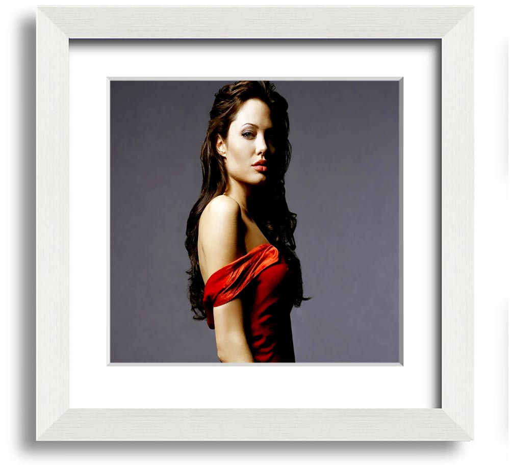 Framed print of Angelina Jolie in a red dress, showcasing elegance and style.