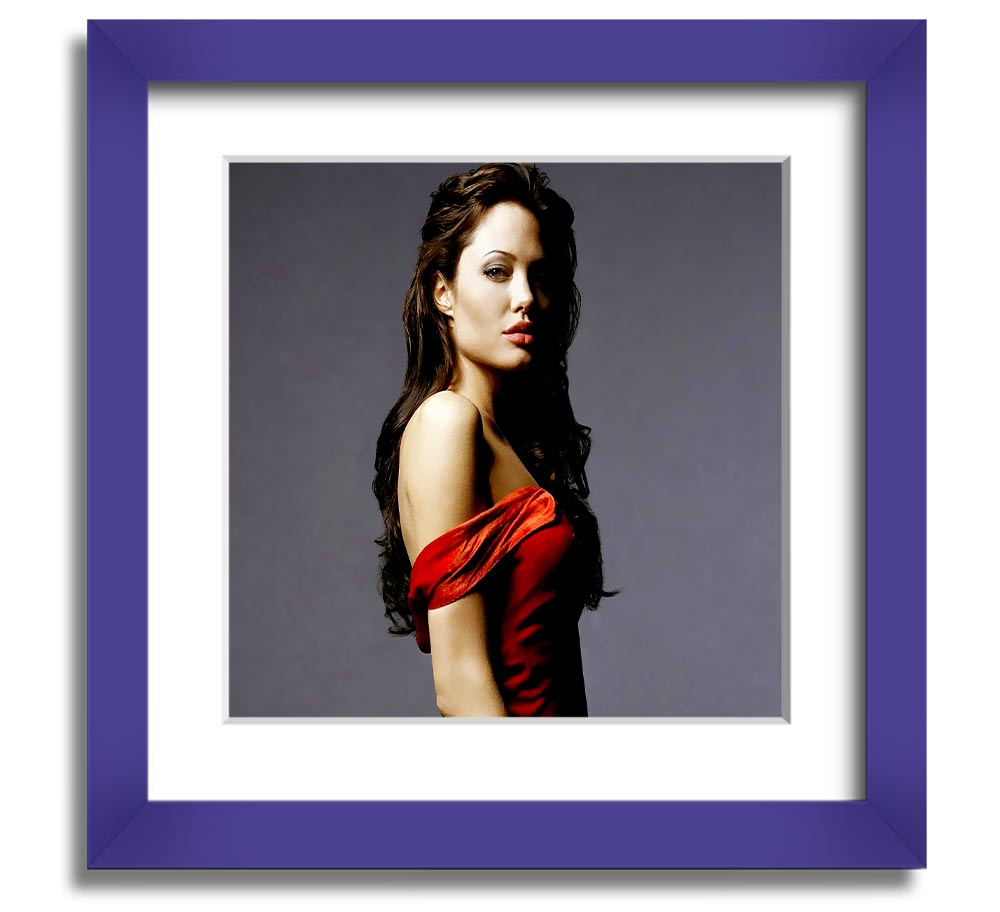 Framed print of Angelina Jolie in a red dress, showcasing elegance and style.