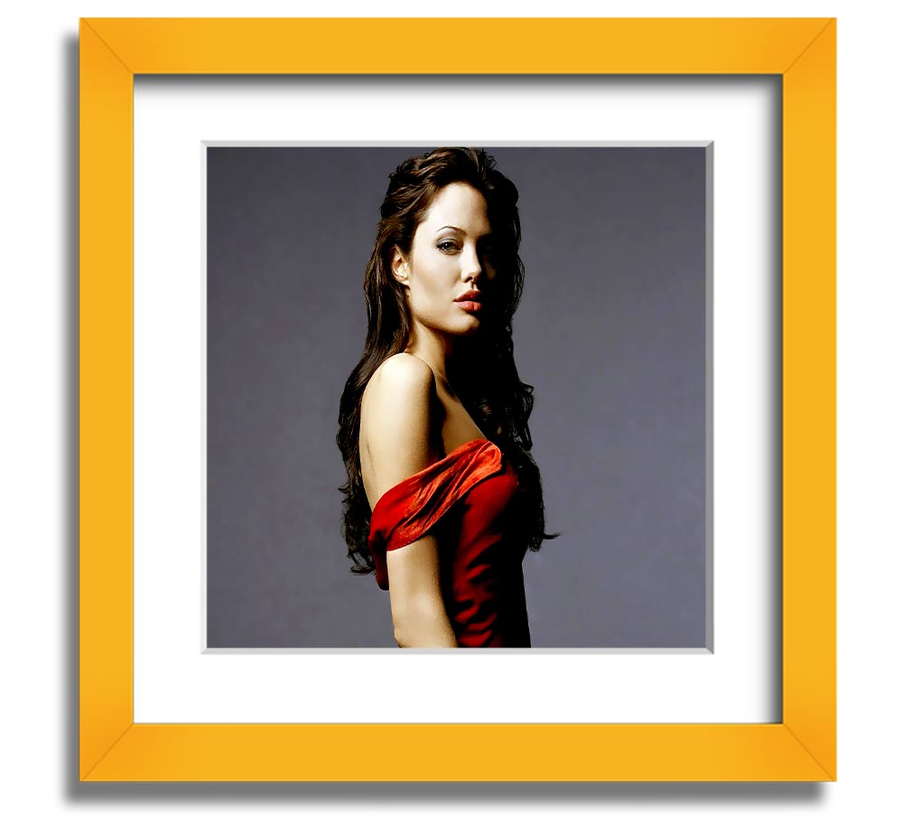 Framed print of Angelina Jolie in a red dress, showcasing elegance and style.