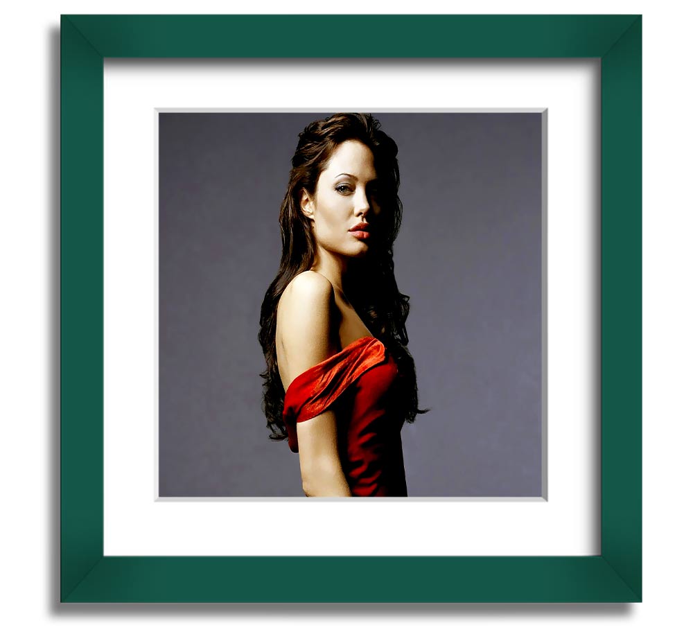 Framed print of Angelina Jolie in a red dress, showcasing elegance and style.