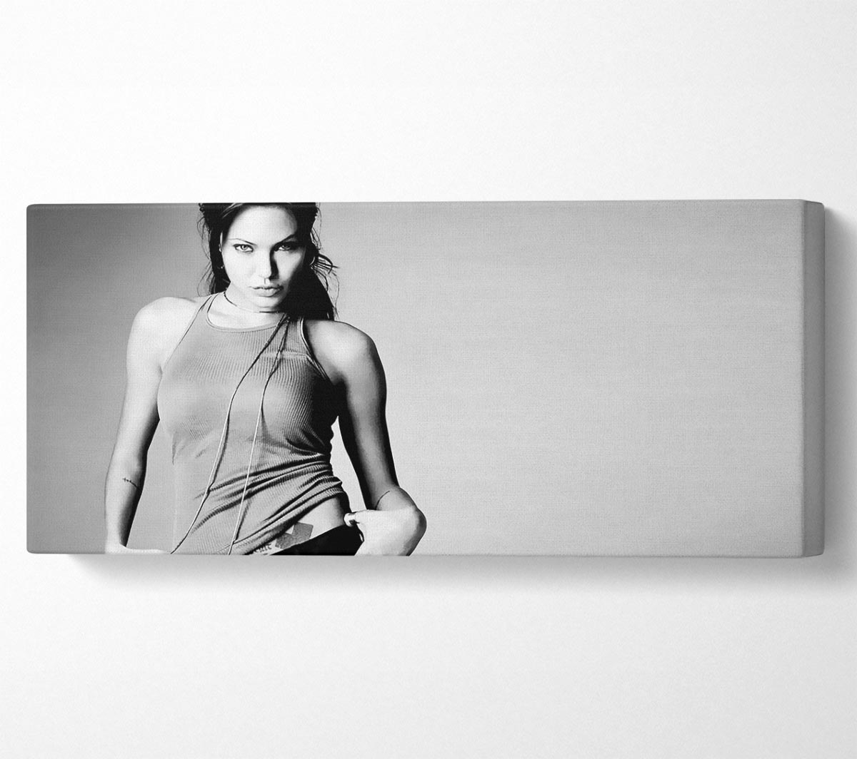 Black and white canvas art featuring Angelina Jolie, mounted on a sturdy box frame, ready to hang.