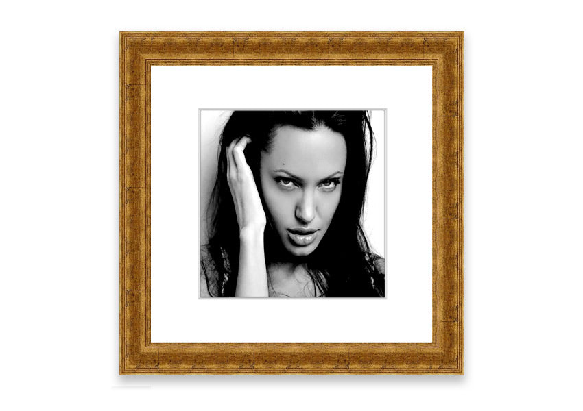 Framed print of Angelina Jolie with captivating eyes, available in various frame colors, handmade in the UK.