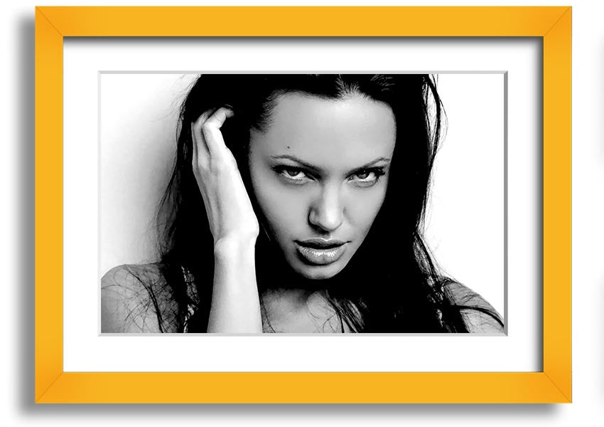 Framed print of Angelina Jolie's captivating eyes, showcasing her beauty and elegance.