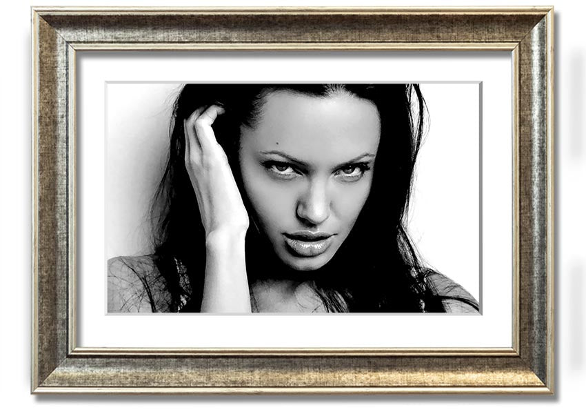 Framed print of Angelina Jolie's captivating eyes, showcasing her beauty and elegance.