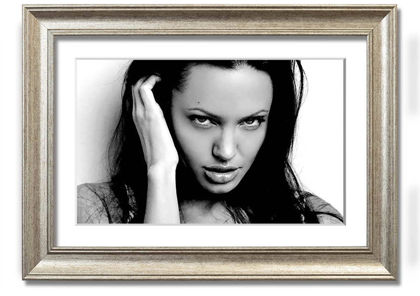 Framed print of Angelina Jolie's captivating eyes, showcasing her beauty and elegance.