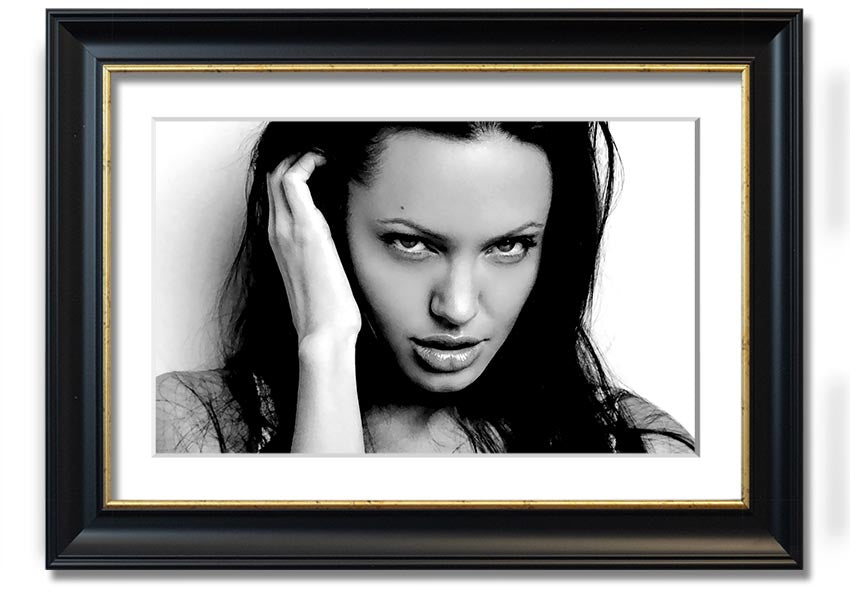 Framed print of Angelina Jolie's captivating eyes, showcasing her beauty and elegance.