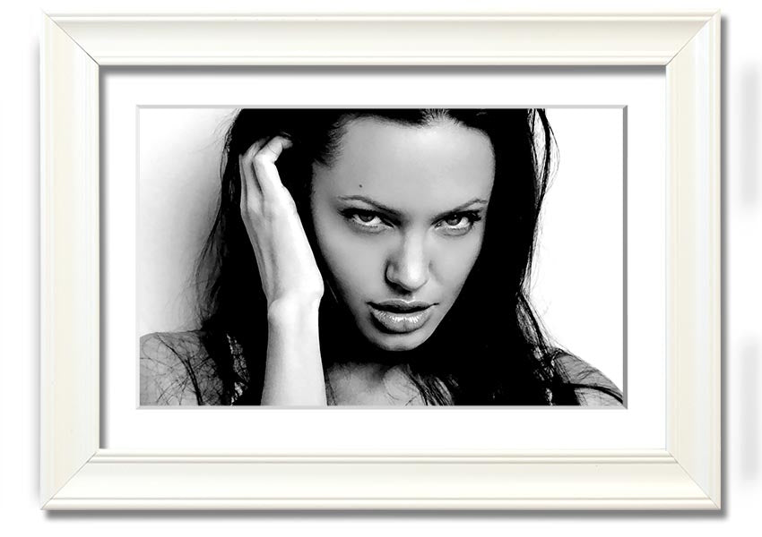 Framed print of Angelina Jolie's captivating eyes, showcasing her beauty and elegance.