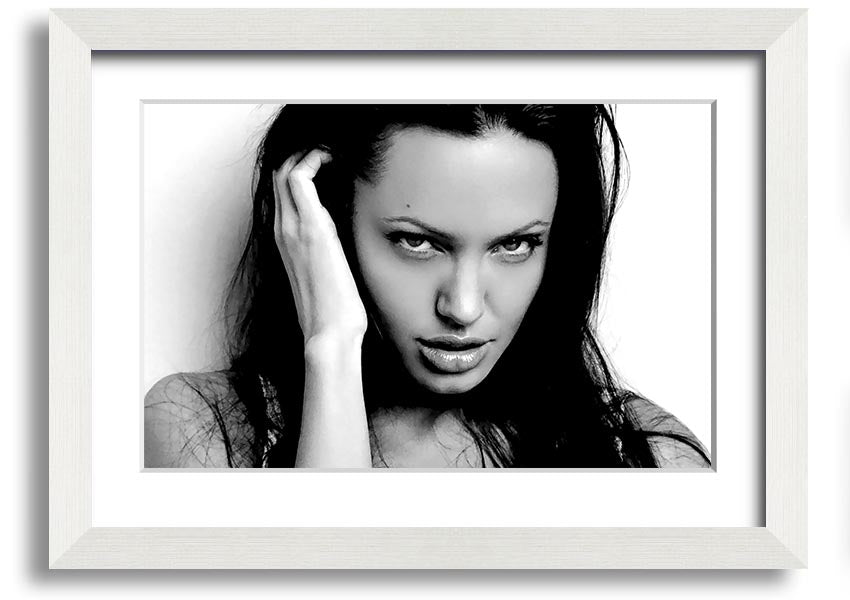 Framed print of Angelina Jolie's captivating eyes, showcasing her beauty and elegance.