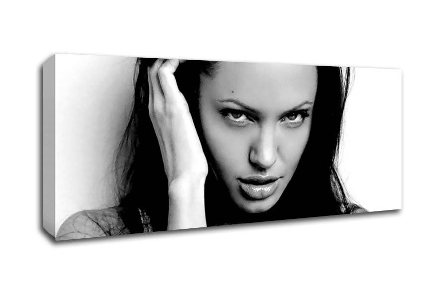 Canvas art featuring Angelina Jolie's captivating eyes, mounted on a sturdy box frame, ready to hang.