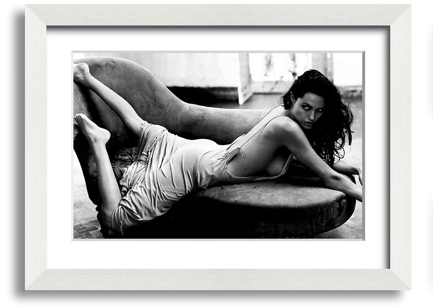 Angelina Jolie Sofa B n W framed print, showcasing a stylish black and white design, ready to hang.