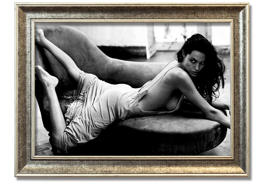 Angelina Jolie Sofa B n W framed print, showcasing a stylish black and white design, ready to hang.