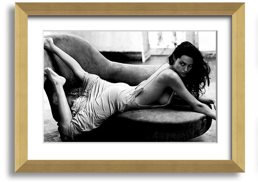 Angelina Jolie Sofa B n W framed print, showcasing a stylish black and white design, ready to hang.