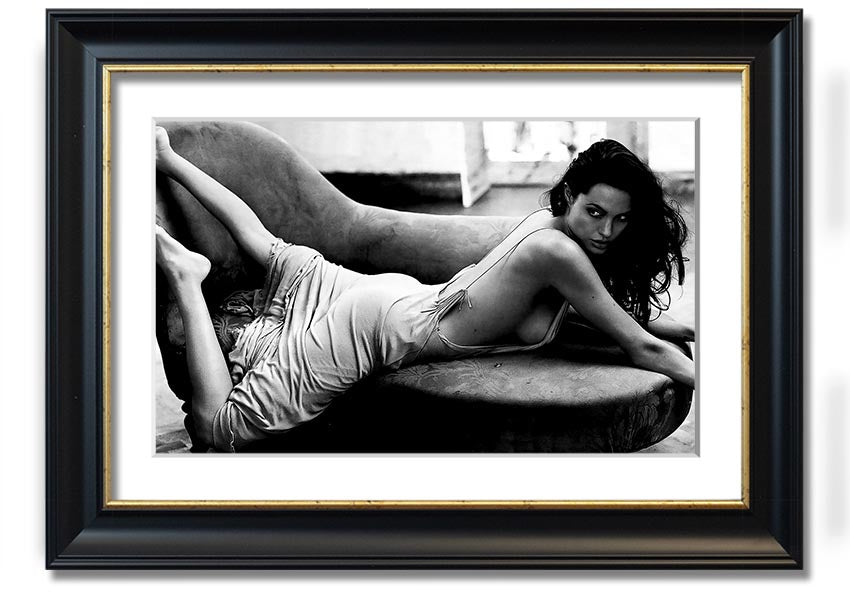 Angelina Jolie Sofa B n W framed print, showcasing a stylish black and white design, ready to hang.