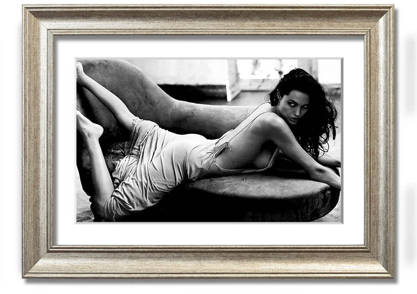 Angelina Jolie Sofa B n W framed print, showcasing a stylish black and white design, ready to hang.