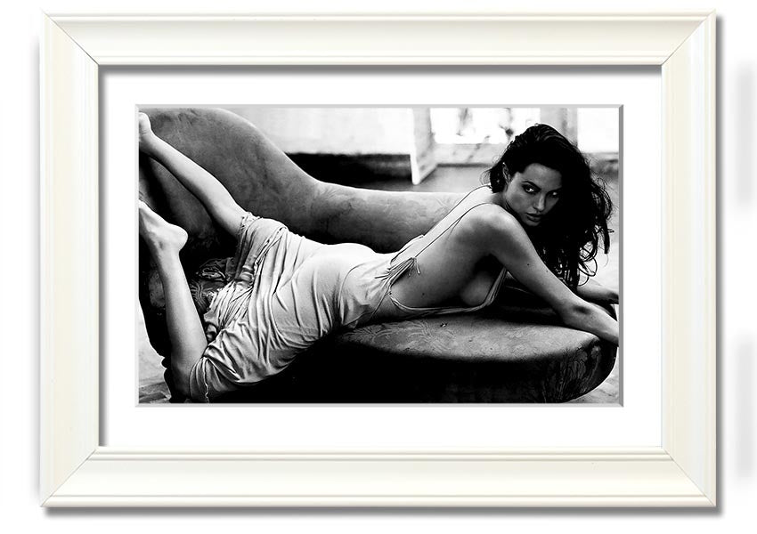 Angelina Jolie Sofa B n W framed print, showcasing a stylish black and white design, ready to hang.