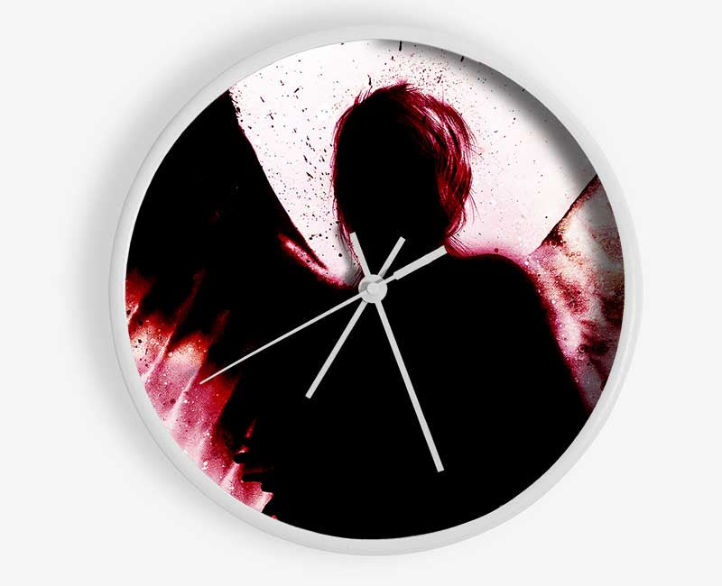 Angels In The Night Red clock made of natural bamboo with a round face and clear Plexiglas lens, showcasing its stylish design.