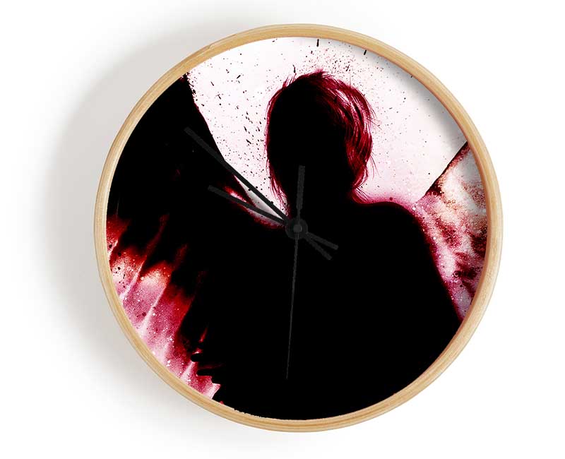 Angels In The Night Red clock made of natural bamboo with a round face and clear Plexiglas lens, showcasing its stylish design.