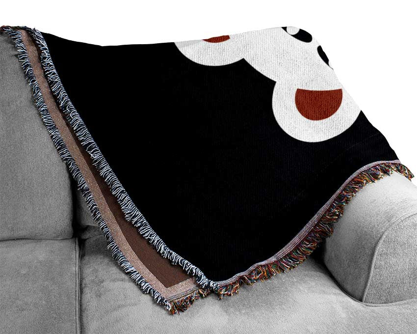 A cozy Angry Monster Mouth throw blanket made from 100% cotton, featuring a unique design and thermal weave for breathability.