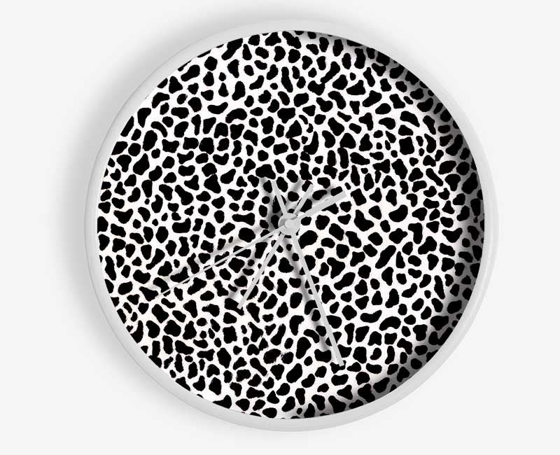 Stylish Animal Print clock made from natural bamboo with a round face and clear Plexiglas lens, available in multiple colors.