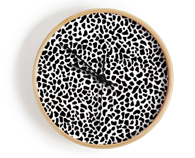 Stylish Animal Print clock made from natural bamboo with a round face and clear Plexiglas lens, available in multiple colors.