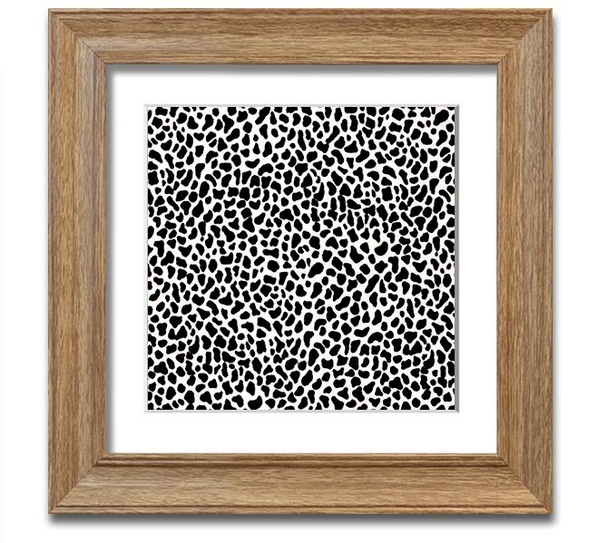 A stylish Animal Print Square Framed Print showcasing a wild design, framed in a chic color, ready to hang on the wall.